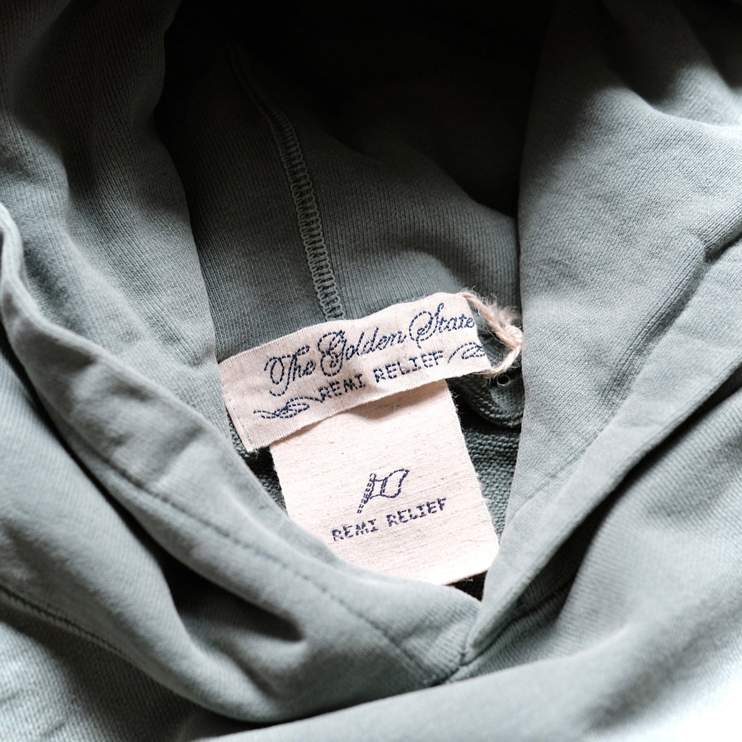 REMI RELIEF Hoodie with Special Finish (VENICE)