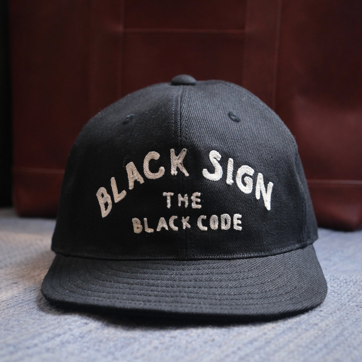 BLACK SIGN "BLACK CODE" Trucker Cap