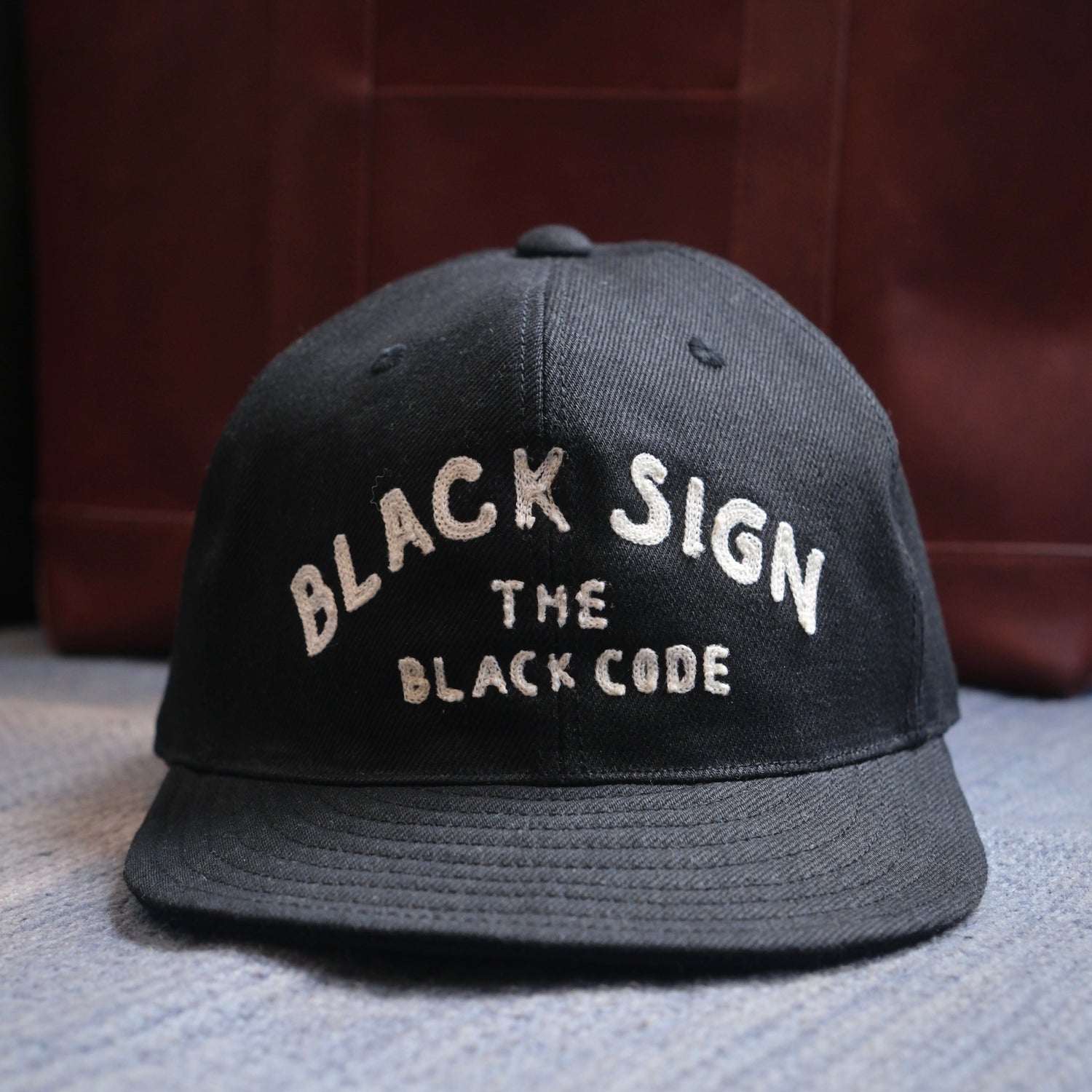BLACK SIGN "BLACK CODE" Trucker Cap